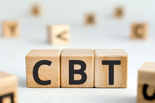 CBT - acronym from wooden blocks with letters, abbreviation CBT Cognitive behavioral therapy